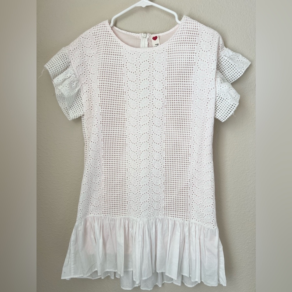White dress with a light pink undertone